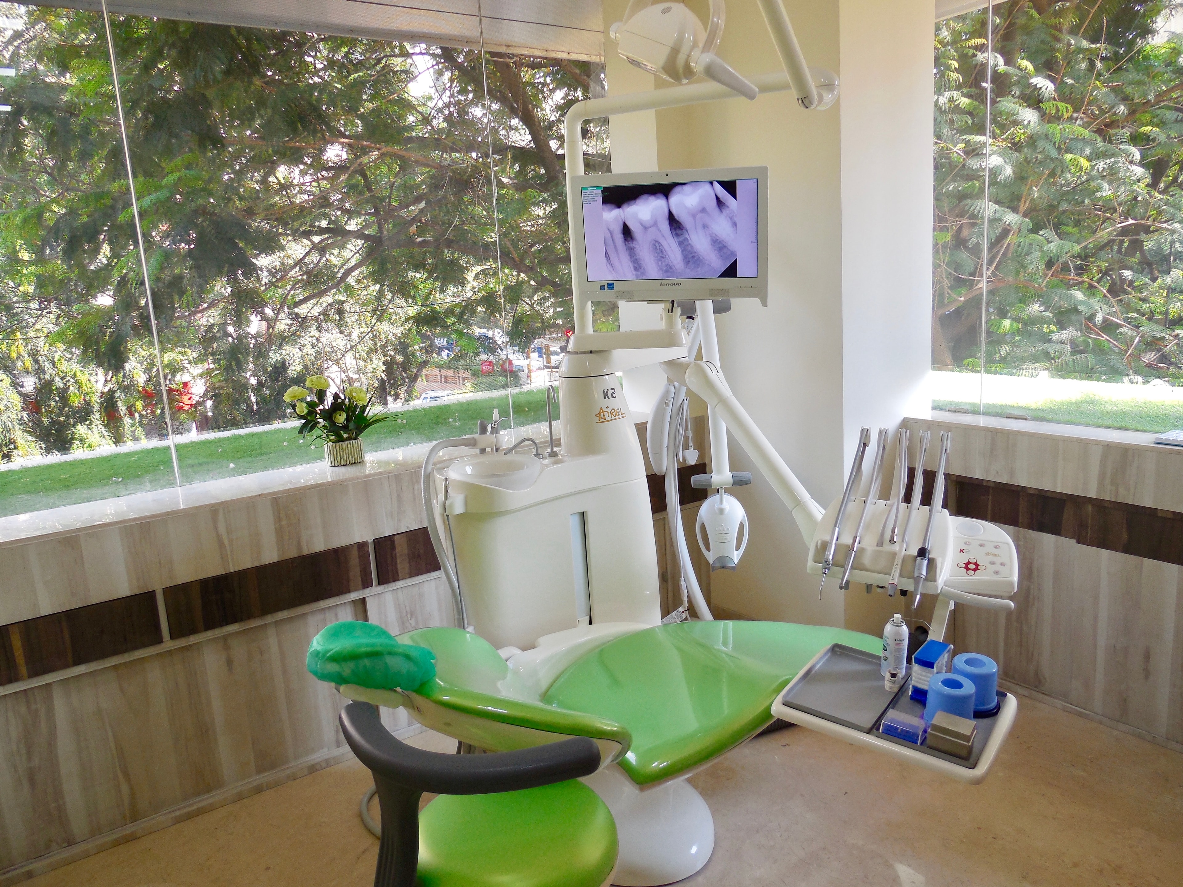 Patient consultation at Divine Smiles